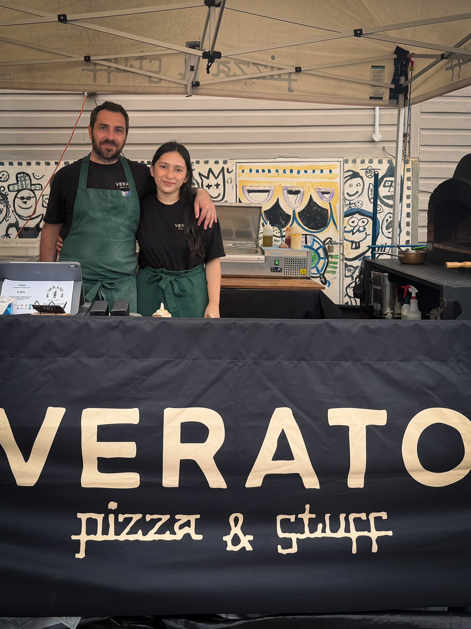 Verato Pizza & Stuff team serving wood-fired pizza at a local Wollongong market stall